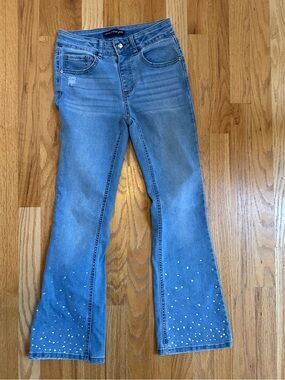 Light Blue Flared Jeans with Studded Hem